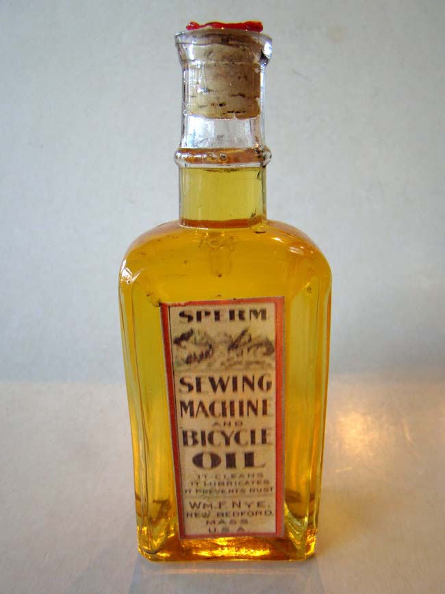 A large unopened bottle of "Sperm Whale Oil" distributed by William F. Nye, New Bedford, MA., circa 1890